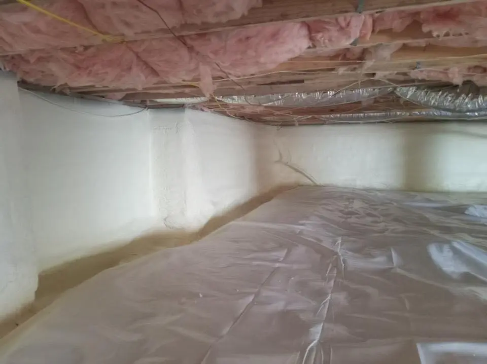 Crawl space encapsulation with closed-cell spray foam for Commercial Roof Restoration in North College Hill